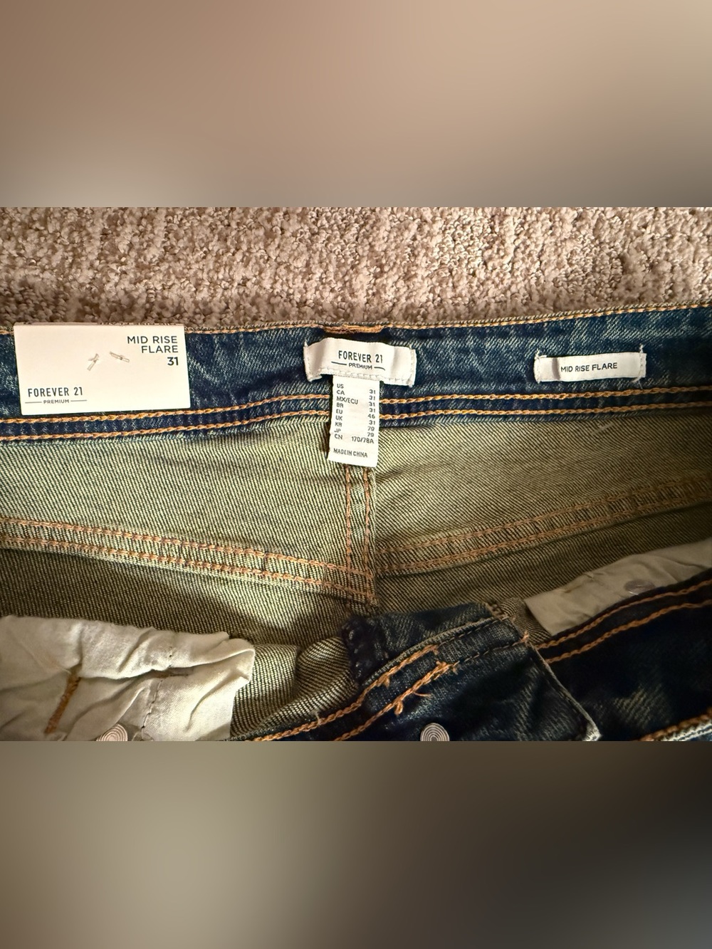 Mid Rise Flared Jeans - Picture 3 of 8